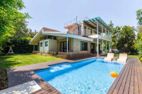 StayVista's Villa Verona - Enjoy a heated pool and snooker table for an unforgettable stay